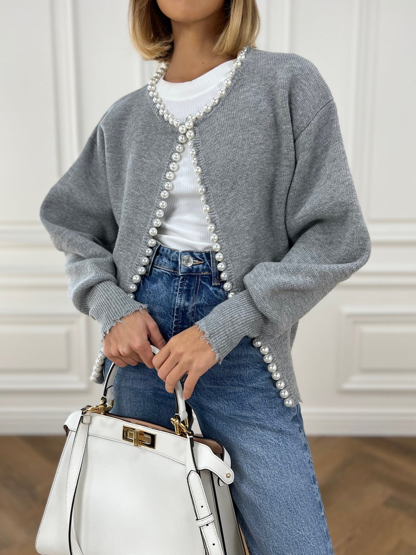 Cardigan mit Perlenbesatz und gefranstem Saum