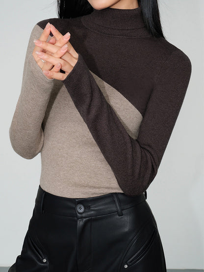 Asymmetrisches Patchwork-Strickoberteil mit langen Ärmeln und Stehkragen