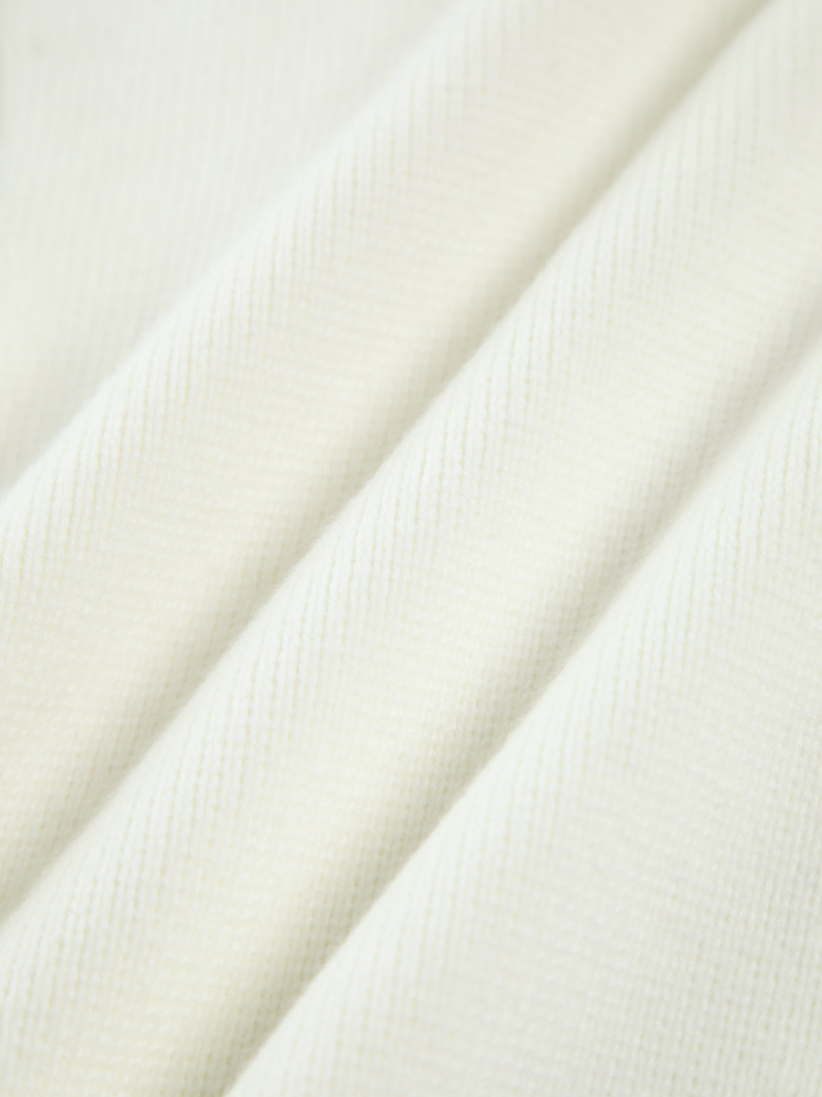 Cardigan mit Perlenbesatz und gefranstem Saum