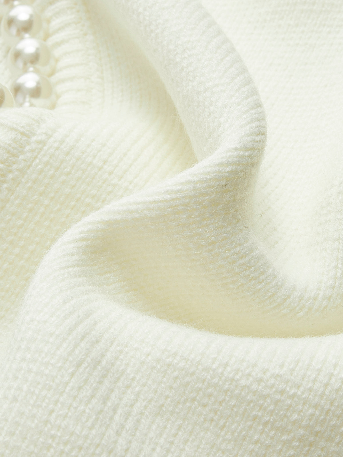 Cardigan mit Perlenbesatz und gefranstem Saum