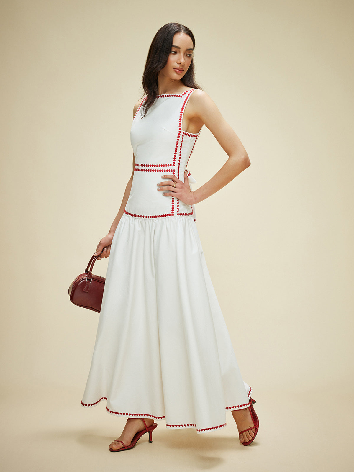 Baumwollkleid mit kontrastierender Paspelierung und Rückenschnürung