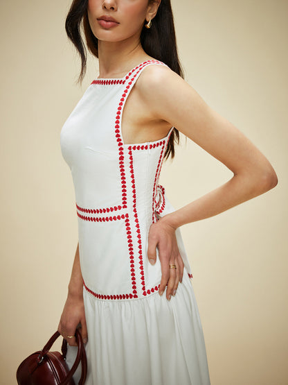 Baumwollkleid mit kontrastierender Paspelierung und Rückenschnürung