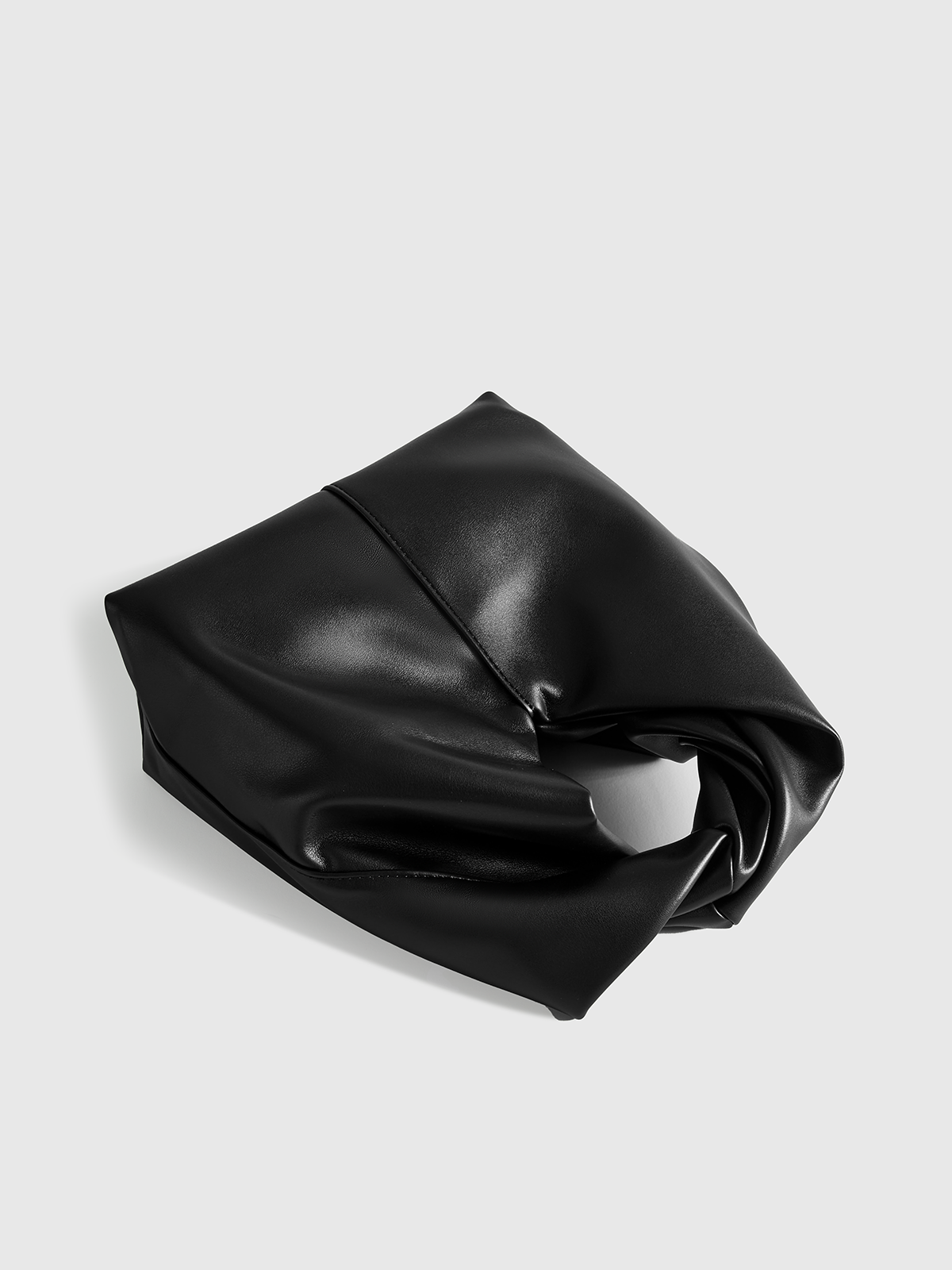 Handtasche aus PU-Leder mit gedrehtem Tragegriff