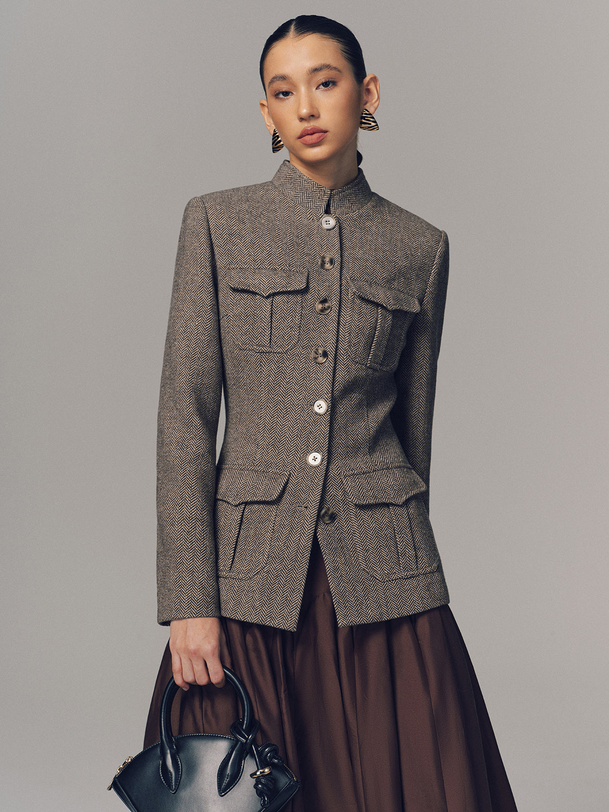 Fischgrätjacke mit Stehkragen und mehreren Taschen